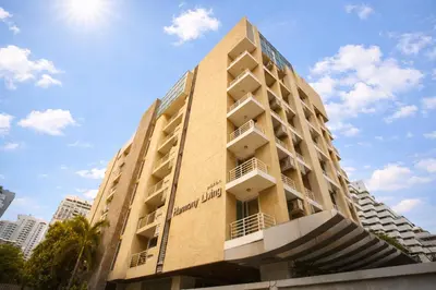 a building with balconies on the side of it at Harmony Living Condominium in Makkasan