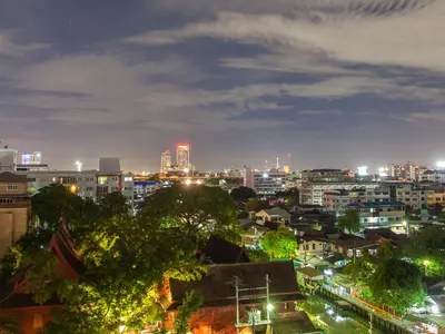 a view of a city at night at The Path Siam in Bangkok