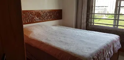 a bed in a bedroom with a window at The Park Land Bangna by Nudda in Bangkok