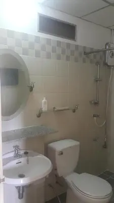 a bathroom with a white toilet and a sink at The Park Land Bangna by Nudda in Bangkok