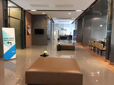 a lobby with a brown bench in a building at New condominium on Sukhumvit Road 