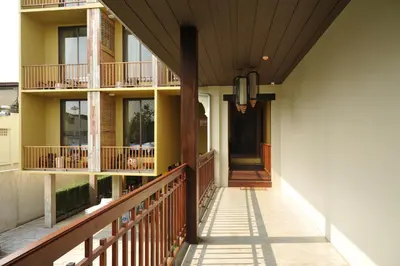a porch of a house with a balcony at Villa Bangkok in Bangkok