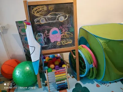 a childs play area with a painting of a car at Beautiful 5 Story Family House in Bangkok