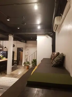 a room with a bed in the middle of a room at Beautiful Super Modern Gigantic Designer Home in Bangkok