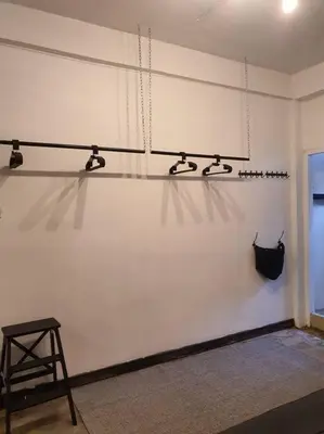 a room with a white wall with lights on it at Great House for Families and Big Groups in Bangkok