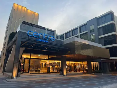 a building with a sign on the front of it at Centara Life Hotel Bangkok Phra Nakhon in Bangkok