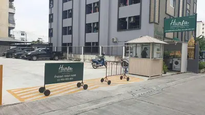 a store with a sign in front of a building at หรรษาเพลส ลาดพร้าว 124 in Ban Bang Toei (1)