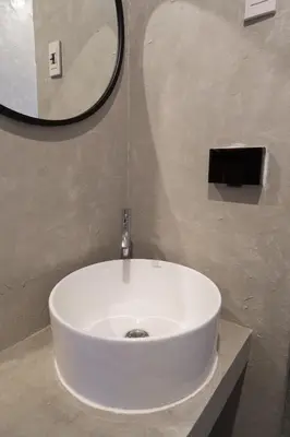 a white sink in a bathroom with a mirror at Lo-Ha Guest house, Contactless Check-in in Bangkok