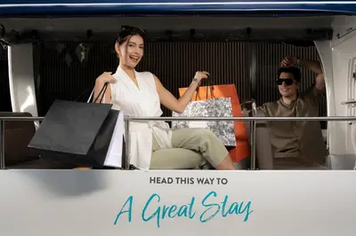 a woman sitting in the back of a truck at Staybridge Suites Bangkok Sukhumvit by IHG in Bangkok