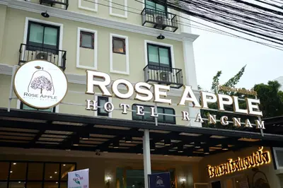 a building with a sign that reads rose apple hotel ragan at Rose Apple Hotel in Bangkok