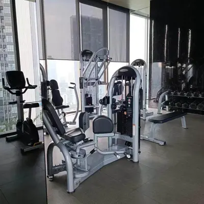 a gym with cardio equipment in a large building at Sathon Luxury High-rise Apartment City View KingPower ,IconSiam ,BNH,Silom in Bangkok