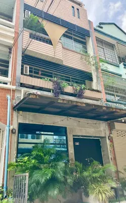 a building with plants on the front of it at CB's - Cheap Boutique Bangkok in Bangkok