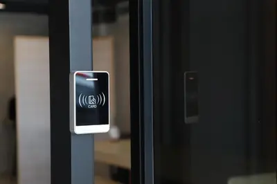 an iphone is attached to a glass door at The Cube Hostel Khaosan in Bangkok
