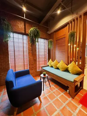 a living room with a couch and a chair at CozyHouse near MRT QSCC Convention Center 4BR 10ppl in Bangkok