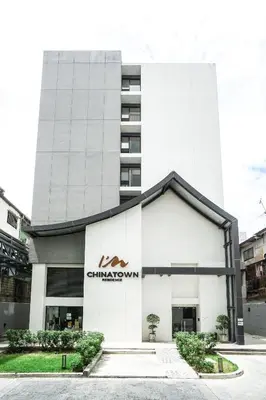 a building with the chinawind logo on it at I'm Chinatown Residence in Bangkok