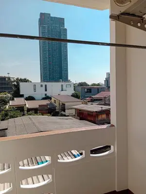 a view from a balcony of a city skyline at Worakarn Apartment 1 in Bangkok