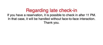 a screenshot of a cell phone with the text regarding late check in at DonMueang Boutique House DonMueang Airport in Bangkok