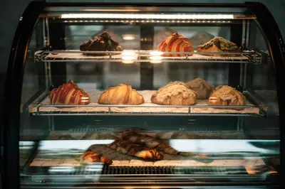 an oven filled with different types of pastries at Laike Hotel in Bangkok
