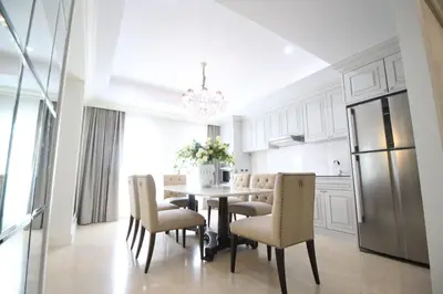 a kitchen and dining room with a table and chairs at SASHA HOUSE in Ban Yang