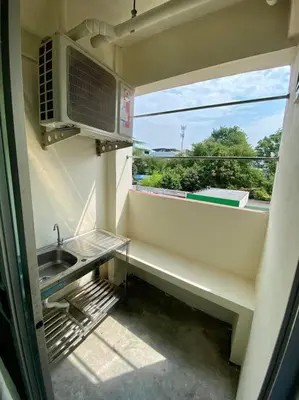 a small kitchen with a sink and a window at Ratanawong Place 807 in Bangkok