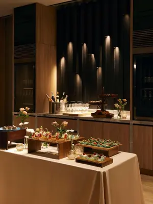 a table with a bunch of food on it at dusitD2 Samyan Bangkok in Bangkok