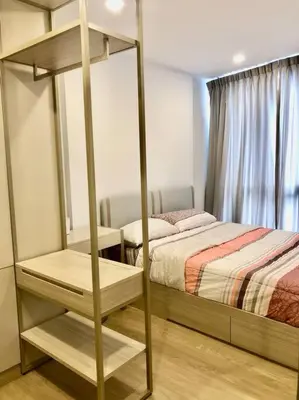 a bedroom with two beds and a bunk bed at NEST Sukhumvit71 BTS - Pool, Fitness, Parking, Wifi in Bangkok