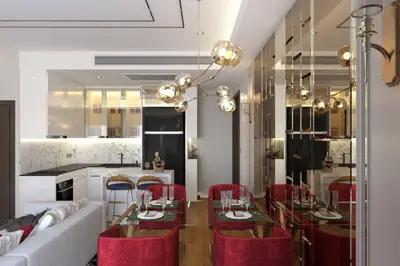 a kitchen with a dining table and red chairs at Luxury 2BR on the Clouds in Prime area Bangkok in Bangkok