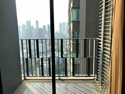 a balcony with a view of a city from a building at 1BR Luxury Condo 50m to Thonglor BTS station in Bangkok