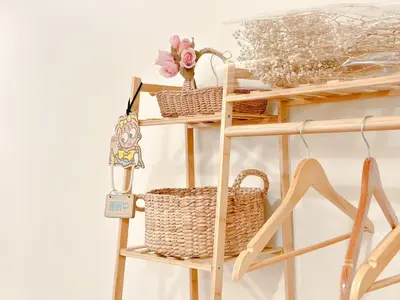 a shelf with baskets and a tag on it at Happiness Sleep in Thung Si Kan